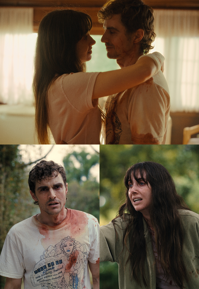 二人が抱き合っている写真。男のTシャツは血で濡れている。